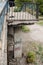 The collapsing bridge. Damaged bridge support close - up transportatin concrete