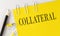 COLLATERAL word on the yellow paper with office tools on white background