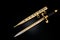 collectible silver dagger with scabbard on black