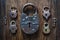 Collection of antique door locks and keys on an old board. Vintage padlock and key. set as a symbol of security, closeness,