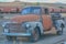 A collection of antique trucks ready to be restored in Sprague, Washington
