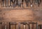 Collection of antique woodworking handtools on a rough workbench old wooden