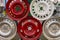 Collection of assorted wheel hubs in red and silver