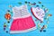 Collection of beautiful clothing for baby-girl.