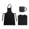 Collection of black objects isolated on white background. Black blank apron, black folded t-shirt, metal mug. Flat lay