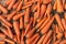 collection of carrots. carrot texture background. Vegetarian food rich in vitamins