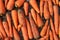 collection of carrots. carrot texture background. Vegetarian food rich in vitamins