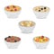 Collection of cereal porridge in bowl with fruits and nuts. Healthy breakfast.