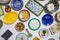 Collection of colorful Portuguese ceramic pottery, local craft products from Portugal. Ceramic plates display in Portugal.