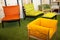 Collection of colorful seats on decorative green floor