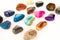 Collection of colorful semiprecious gemstones on white background