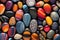 a collection of colorful, smooth, and uniquely shaped pebbles