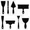 Collection of different construction spatulas