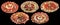 Collection of Five Plateful Garnished Appetizer Savory Dishes Isolated on Black Background