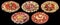 Collection of Five Plateful Garnished Appetizer Savory Dishes Isolated on Black Background