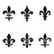 Collection of fleur de lis symbols, black silhouettes - heraldic symbols. Vector Illustration. Medieval signs. Glowing french fleu