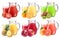 Collection of fresh juices in pitchers.