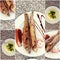 Collection of fried Fish and puree on Table Photo Collage of Toned Images