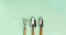 Collection of gardening, trowel, spade and rake on a green background. Garden tools. Panorama