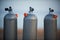 Collection of grey scuba diving air oxygen tanks.