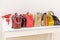 Collection of handbags standing in a row