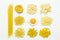 Collection of italian pasta, flour and chicken egg isolated top view.