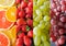 Collection of juicy fruits in vertical strips.