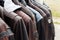 Collection of leather jackets on hangers in the shop