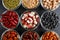 Collection of legumes in the cup isolated on black background