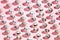 Collection of little quail eggs isolated on pink background