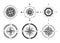 Collection of logos of the compass. Stylized sea compasses with a wind rose. Measuring device. Black and white vector