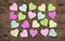 Collection on many colorful hearts on wooden background for love