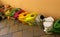 Collection of Many watering cans of many colors and many shapes