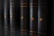 Collection of a multi-volume old encyclopedia in a dark, worn cover with yellowish numbers. Books with knowledge. Learning