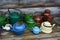 Collection of multicolored teapots from the last century, rural motive