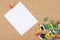 Collection of note papers on corkboard