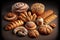 a collection of numerous fresh baked breads