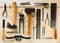 Collection of old, used wood working tools flat lay from above on wooden background - repair, craftsmanship or workshop concept