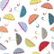 Collection of orange, yellow, blue umbrellas with drawn rainy drops seamless pattern. Vector illustration on white background