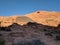 Collection of petroglyphs on distant hill at Valley of Fire, Nevada