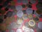 Collection of Polish coins on a red background. Zloti and grochi