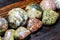 Collection of processed stones of different colors - magmatites