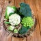 Collection of Romanesco broccoli and cauliflower on the kitchen table