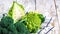 Collection of Romanesco broccoli and cauliflower on the kitchen table. place for text