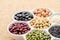 Collection set of beans, legumes, peas, lentils on ceramic bowl.