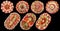 Collection of Seven traditional garnished Welcome Appetizer Savory Dishes Isolated on Black Background