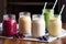 collection of smoothie and shake recipes, featuring fruit, veggies, protein powder and other ingredients