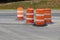 Collection of traffic safety barrels, road construction safety zone