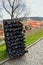 Collection wines aging in the rack outdoors against old town Prague