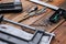 Collection of woodworking tools on a wooden background